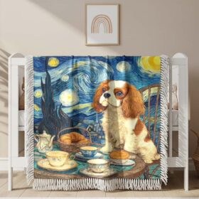 A cute cream and white King Charles Spaniel puppy Woven Blanket